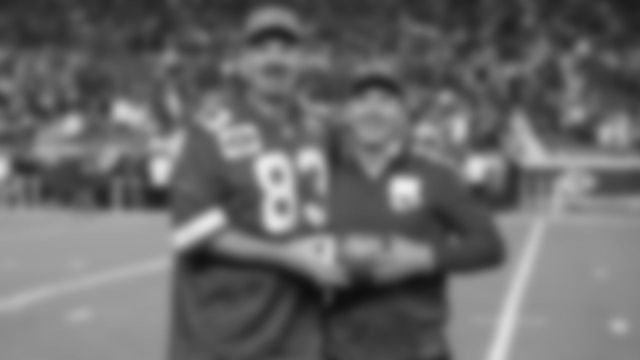 First Pass - Dr. Matthew Naylor President and CEO of the WWI Museum and Memorial with Ambassador Kendall Gammon prior to a week 8 NFL Football game against the Washington Commanders on Monday, October 27, 2025 in Kansas City, MO.