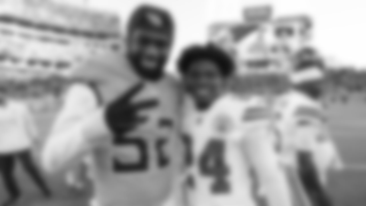 Titans linebacker James Williams Sr. (52) and Kansas City Chiefs running back Brashard Smith (24) after a week 16 NFL Football game against the Tennessee Titans on Sunday, December 21, 2025 in Nashville, Tennessee.
