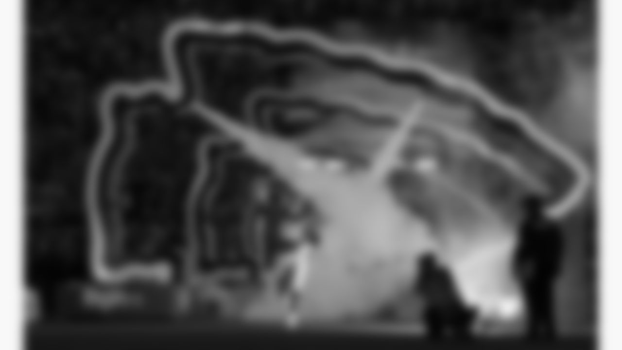 Kansas City Chiefs guard Trey Smith (65) runs out the tunnel for the week 6 NFL football game against the Detroit Lions, Sunday, October 12, 2025 in Kansas City, MO.