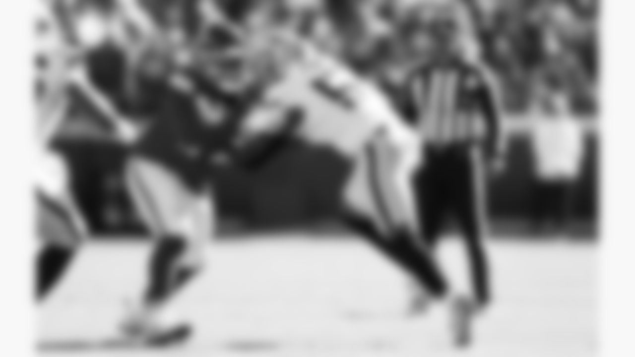 Kansas City Chiefs offensive lineman Jaylon Moore (77) blocks Las Vegas Raiders defensive end Malcolm Koonce (51) during a week 7 NFL football game, Sunday, October 19, 2025 in Kansas City, MO.