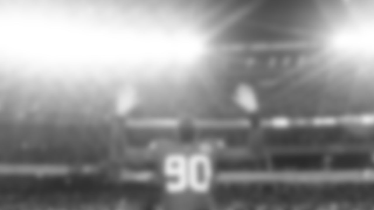 Kansas City Chiefs defensive end Charles Omenihu (90) holds up his arms prior to a week 14 NFL football game against the Houston Texans, Sunday, December 7, 2025 in Kansas City, MO.