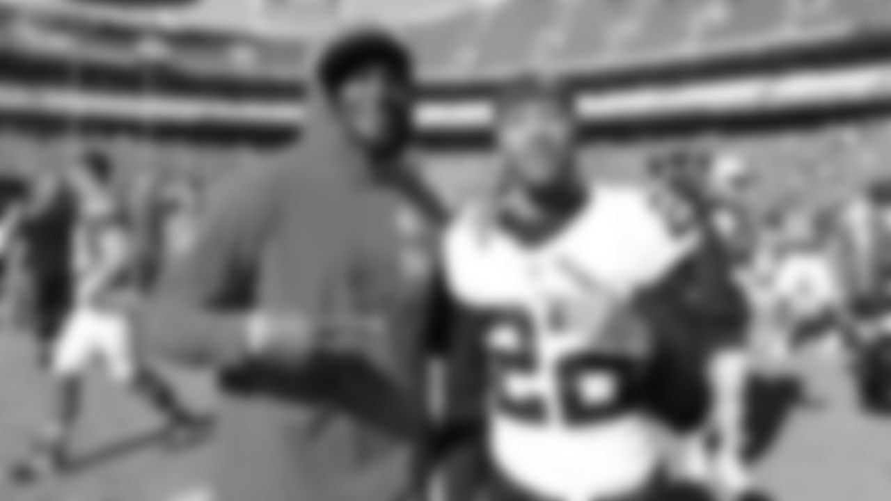 Kansas City Chiefs defensive end Malik Herring (94) poses with Las Vegas Raiders cornerback Eric Stokes (22) after a week 7 NFL Football game against the Las Vegas Raiders on Sunday, October 19, 2025 in Kansas City, MO.