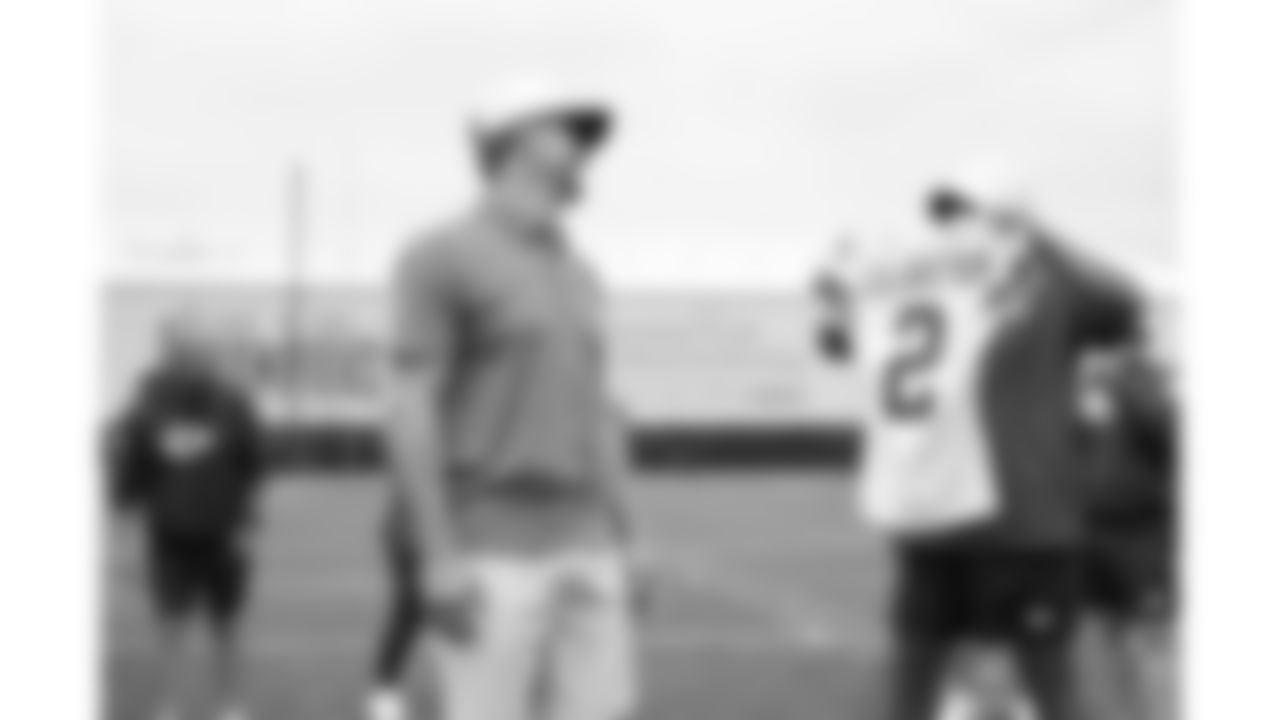 Former Kansas City Chiefs punter Dustin Colquitt is presented a jersey during phase 3 of OTAs on Wednesday, June 4, 2025 in Kansas City, MO.