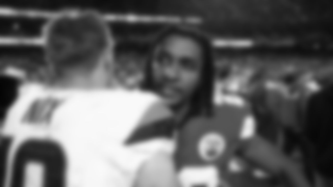 Kansas City Chiefs defensive back Nohl Williams (20) talks with Denver Broncos quarterback Bo Nix (10) after an NFL week 17 matchup against the Denver Broncos, Thursday, December 25, 2025.