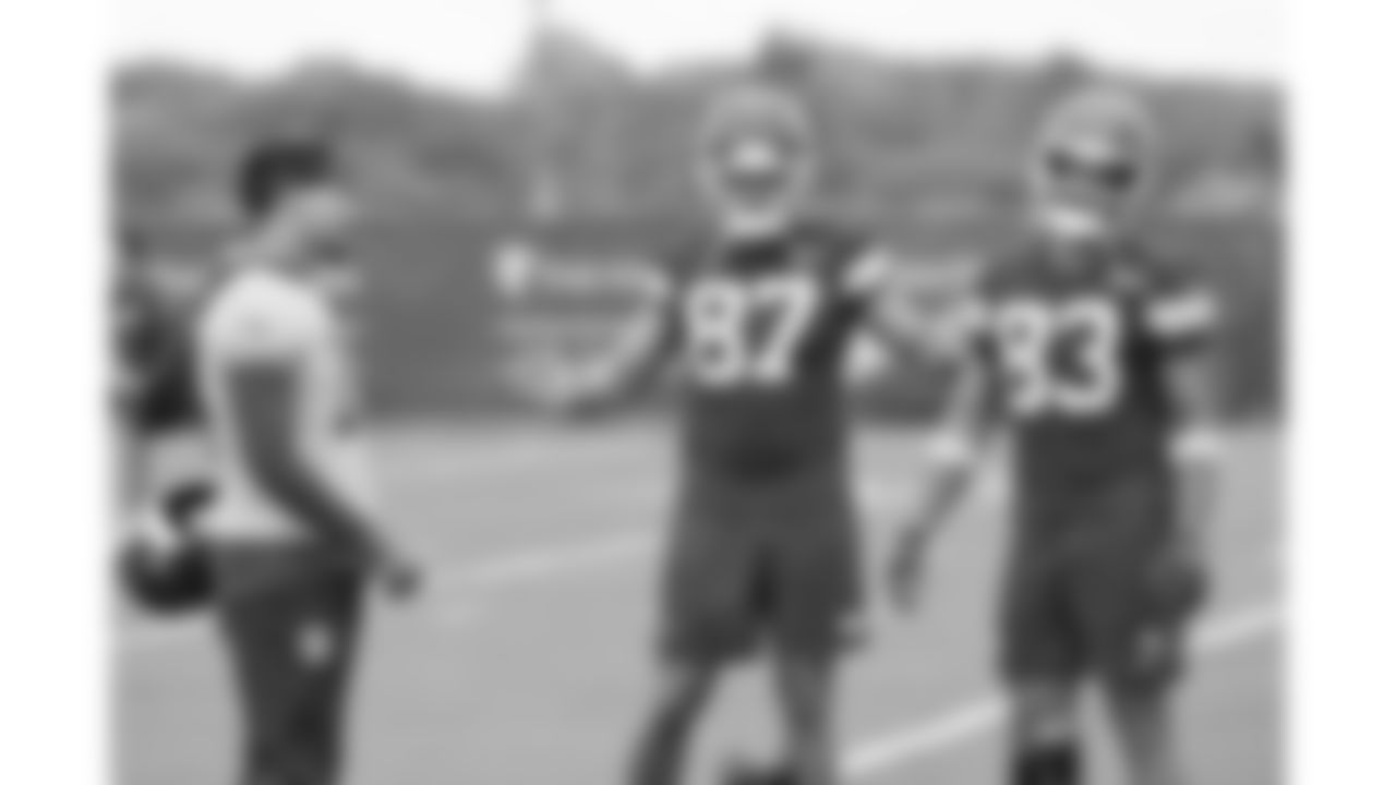 Kansas City Chiefs quarterback Patrick Mahomes (15) speaks with tight ends Travis Kelce (87) and Noah Gray (83) during practice on September 1, 2025, Kansas City, MO.