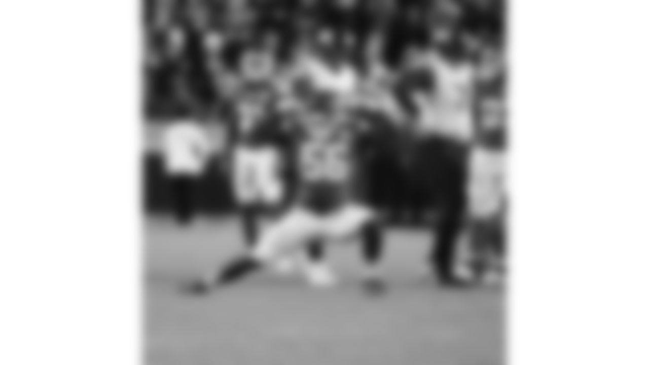 Kansas City Chiefs defensive end George Karlaftis (56) flexes during a week 8 NFL Football game against the Washington Commanders on Monday, October 27, 2025 in Kansas City, MO.