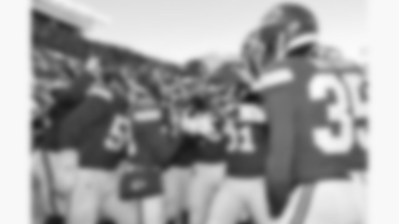 The Kansas City Chiefs defense celebrates in the end zone after an interception during a week 15 NFL football game against the Los Angeles Chargers, Sunday, December 14, 2025 in Kansas City, MO.