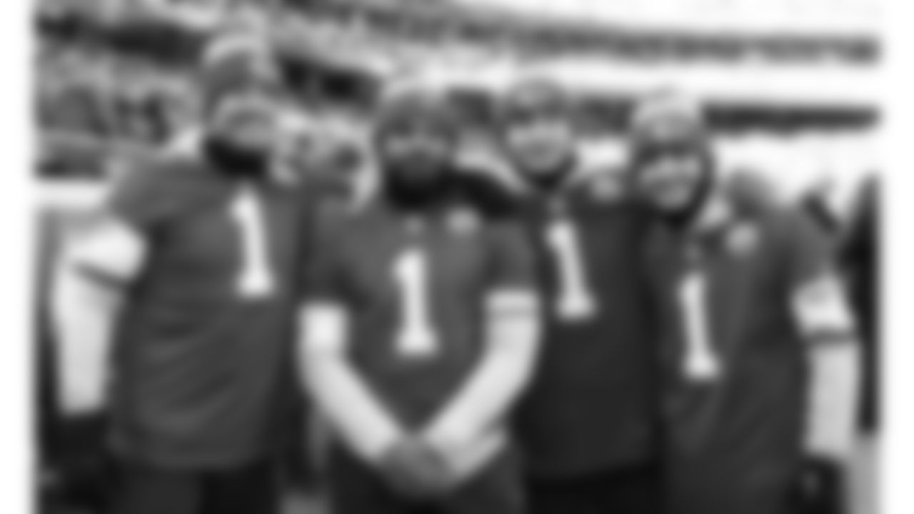 Chiefs Flag Runners on the filed prior to a week 15 NFL Football game against the Los Angeles Chargers on Sunday, December 14, 2025 in Kansas City, MO.