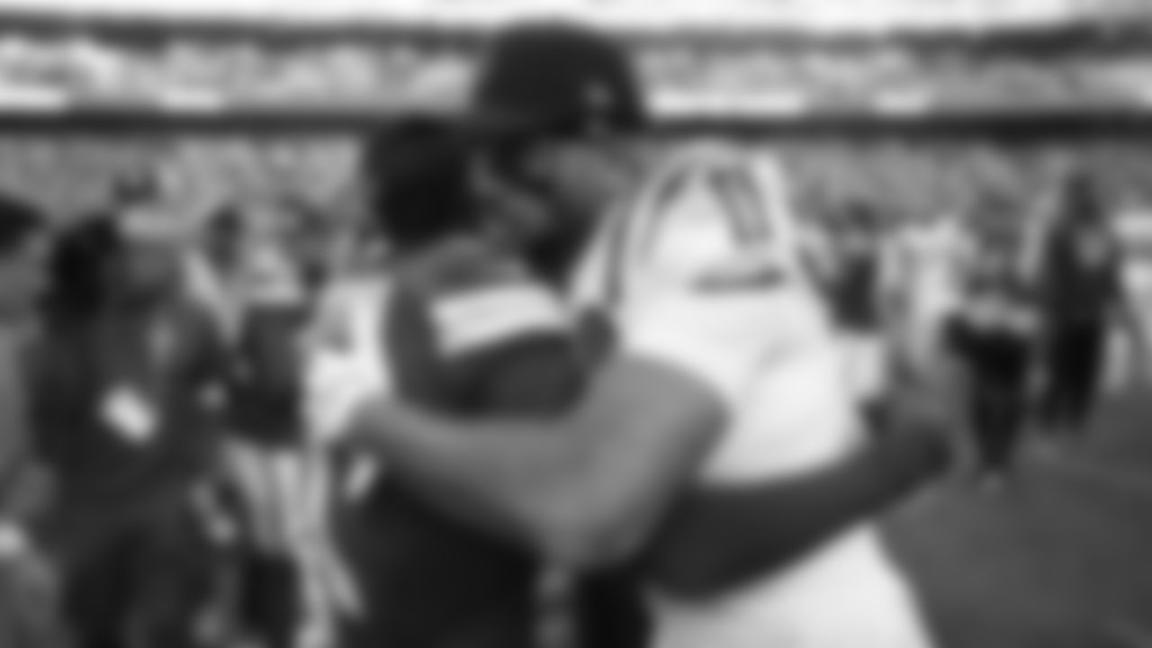 Kansas City Chiefs wide receiver Xavier Worthy (1) hugs Indianapolis Colts wide receiver Michael Pittman Jr. (11) after a week 12 NFL Football game against the Indianapolis Colts on Sunday, November 23, 2025 in Kansas City, MO