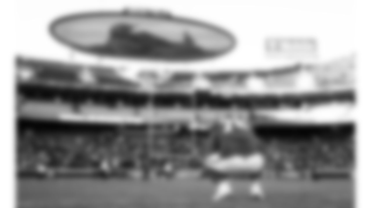 Kansas City Chiefs tackle Kingsley Suamataia (76) squats in the end zone following a week 15 NFL football game against the Los Angeles Chargers, Sunday, December 14, 2025 in Kansas City, MO.