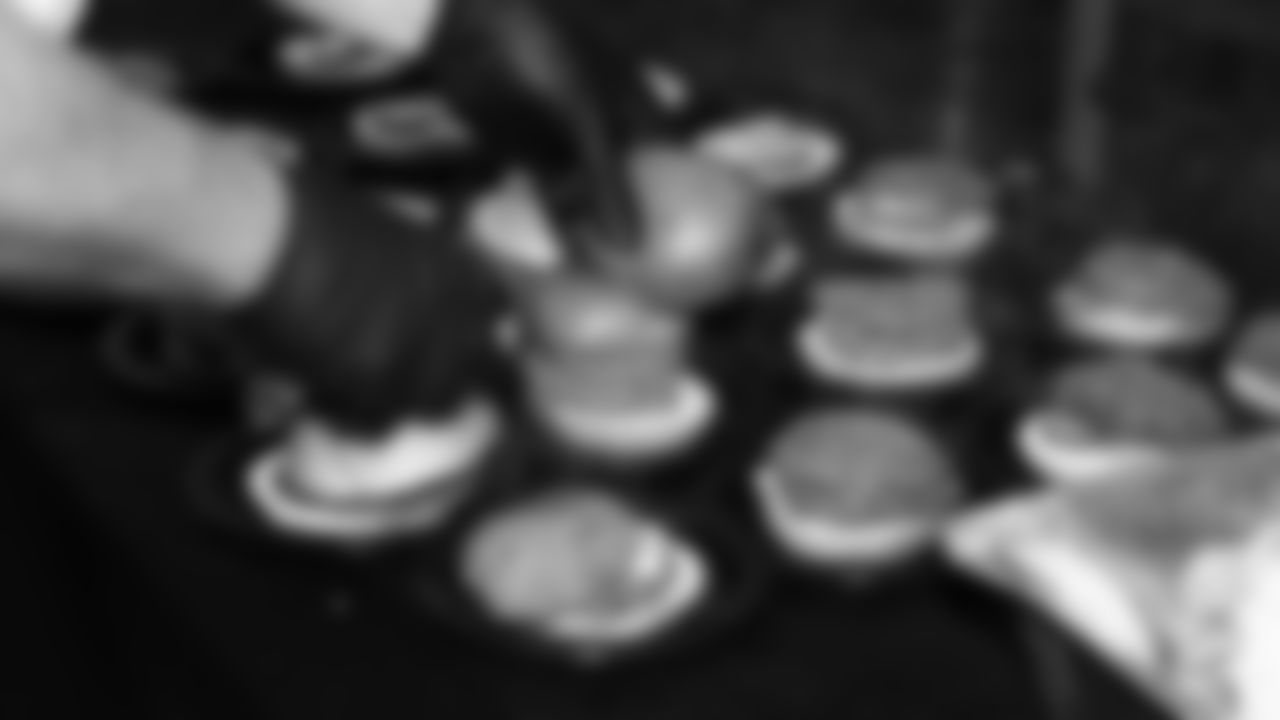 Grilling hamburgers prior to a week 8 NFL Football game against the Washington Commanders on Monday, October 27, 2025 in Kansas City, MO.