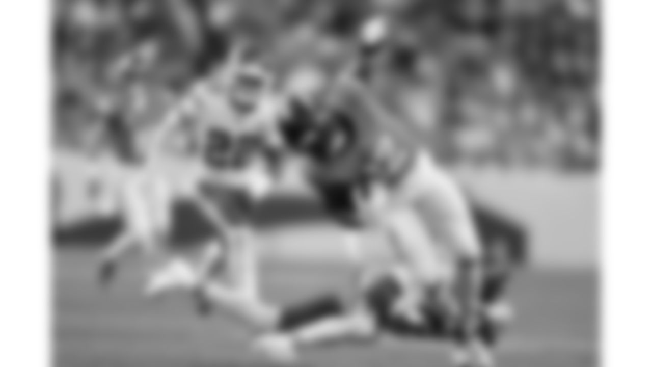 Kansas City Chiefs safety Bryan Cook (6) tackles Broncos running back RJ Harvey (12) during a week 11 NFL Football game against the Denver Broncos on Sunday, November 16, 2025 in Denver, Colorado.