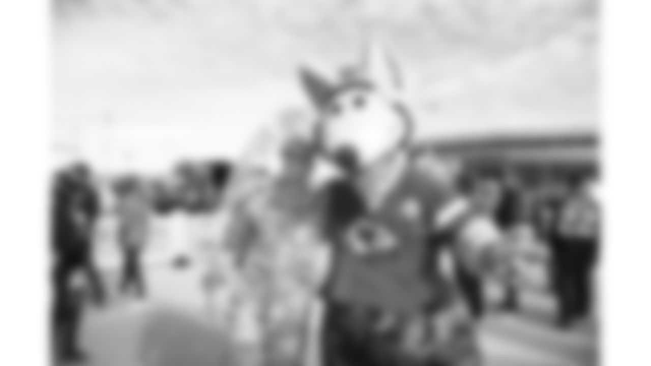 KC Wolf and a U.S. Army soldier prior to the football game between the Kansas City Chiefs and the Minnesota Vikings at Arrowhead Stadium on November 3, 2019.