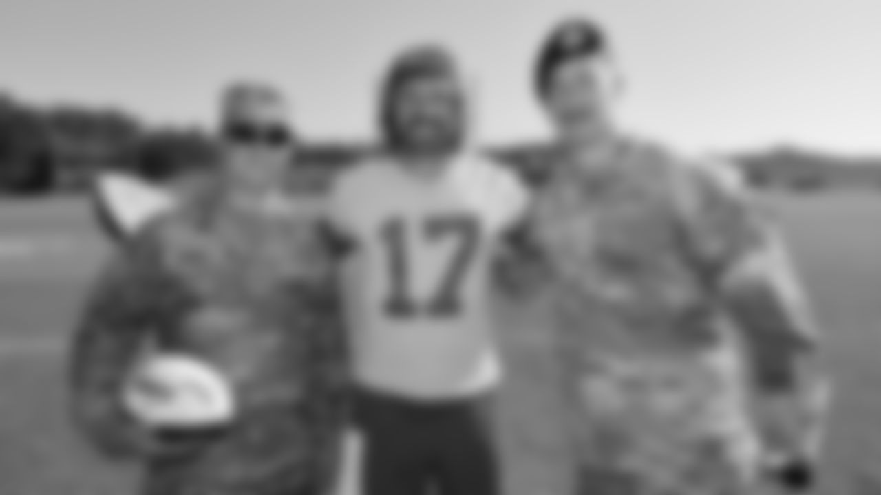 U.S. service members pose with Kansas City Chiefs quarterback Gardner Minshew (17) while attending Military Appreciation Day during day 17 of Training Camp practice on Wednesday, August 13, 2025.