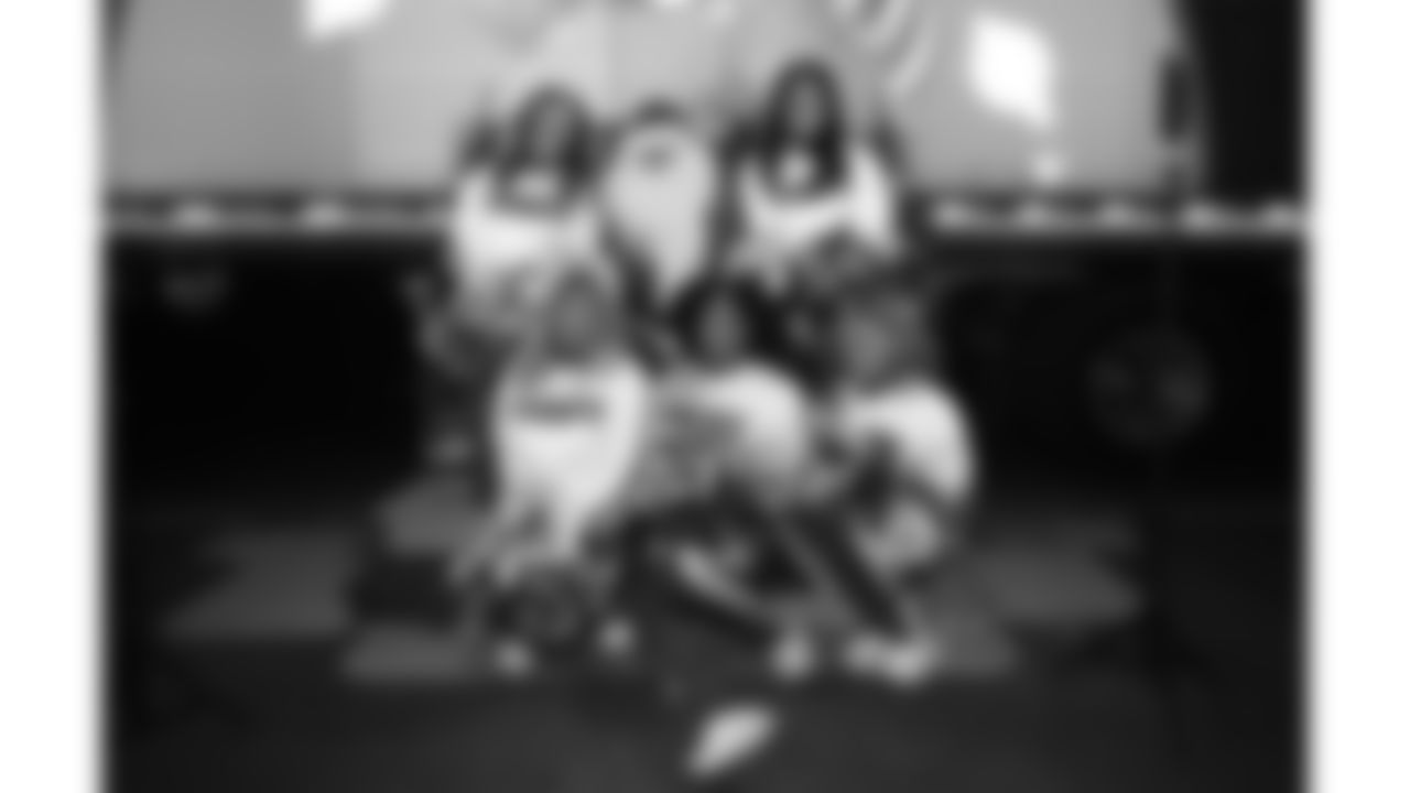 Kansas City Chiefs Cheerleaders pose with the Coca-Cola polar bear at the Ford Tailgate District prior to a week 14 NFL Football game against the Houston Texans on Sunday, December 7, 2025 in Kansas City, MO.