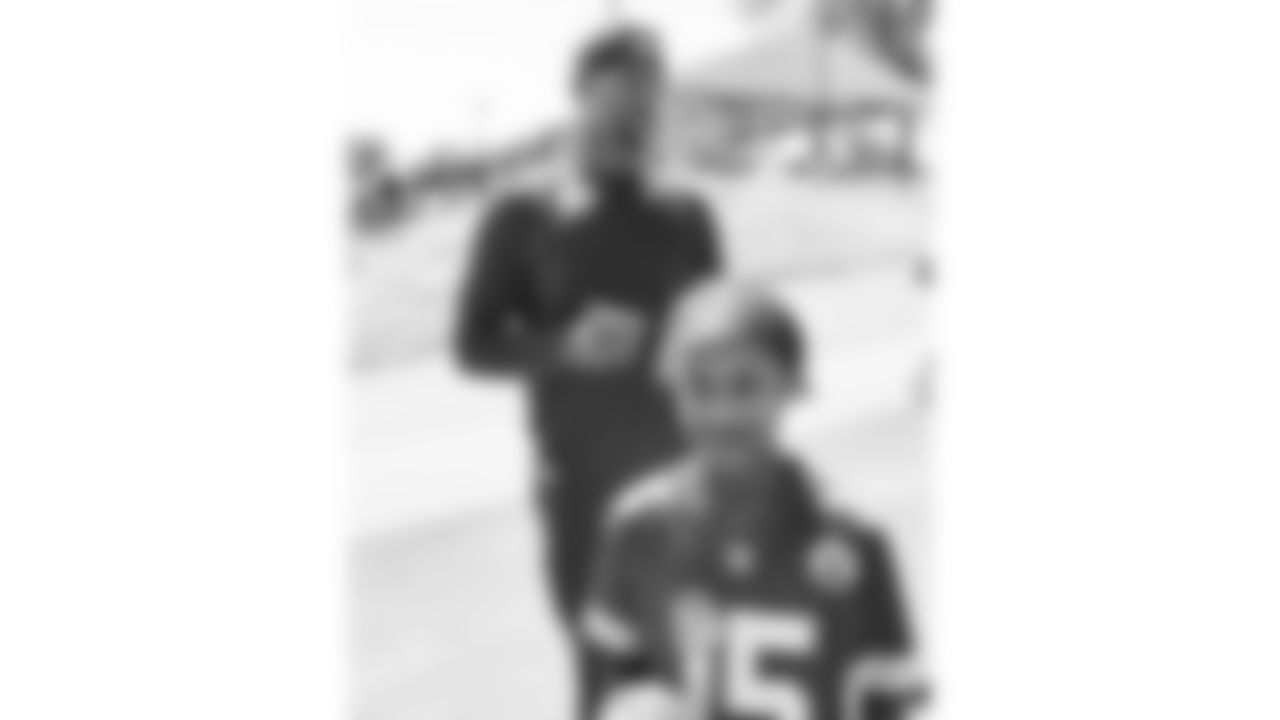 Kansas City Chiefs quarterback Patrick Mahomes (15) with make a wish and dream factory kids during day 7 of training camp on Tuesday July 29, 2025.