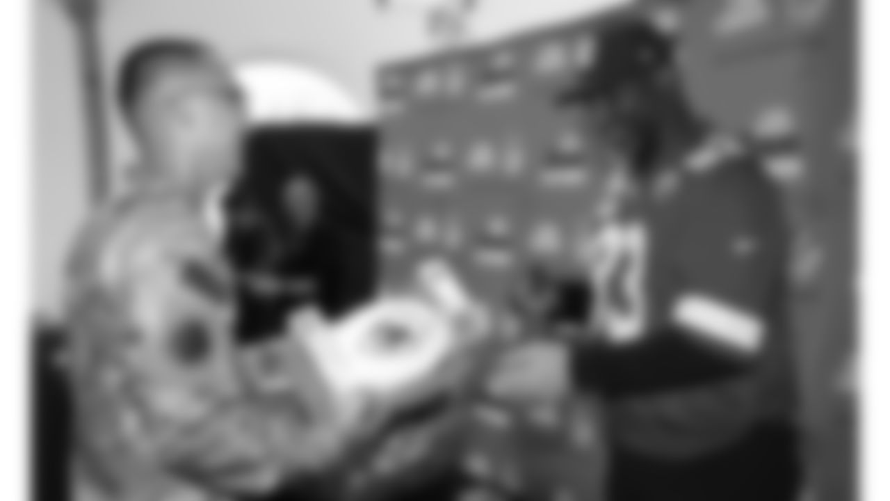 Kansas City Chiefs representatives and the Little Caesars Love Kitchen provide pizza for local U.S. service members and their families at Life.Church Faith & Family Chapel on Tuesday, September 23, 2025 in Kansas City, MO.