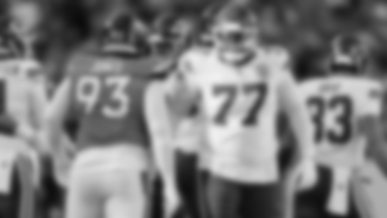 Kansas City Chiefs offensive lineman Jaylon Moore (77) smiles at a Broncos defender during a week 11 NFL Football game against the Denver Broncos on Sunday, November 16, 2025 in Denver, Colorado.