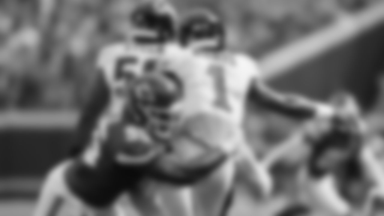 Kansas City Chiefs defensive tackle Chris Jones (95) tackles Philadelphia Eagles quarterback Jalen Hurts (1) during the week 2 NFL football game, Sunday, September 14, 2025 in Kansas City, MO.