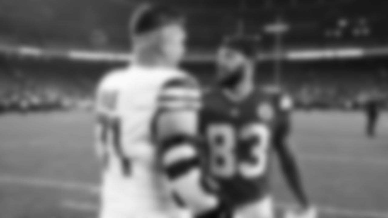 Kansas City Chiefs tight end Noah Gray (83) talks with Washington Commanders Andrew Wylie (71) after a week 8 NFL Football game against the Washington Commanders on Monday, October 27, 2025 in Kansas City, MO.