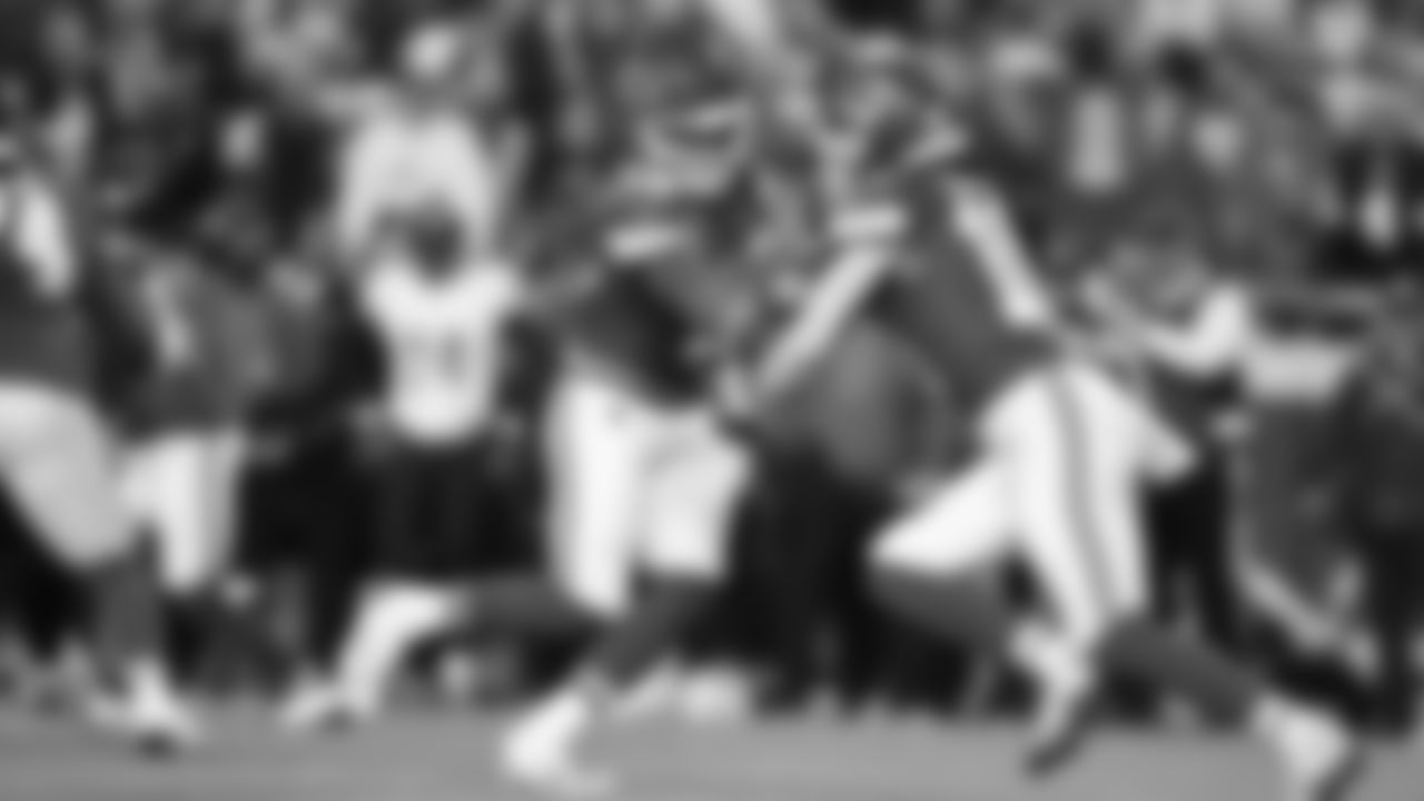 Quarterback Patrick Mahomes (15) hands the ball off to Kansas City Chiefs running back Isiah Pacheco (10) during a week 8 NFL Football game against the Washington Commanders on Monday, October 27, 2025 in Kansas City, MO.