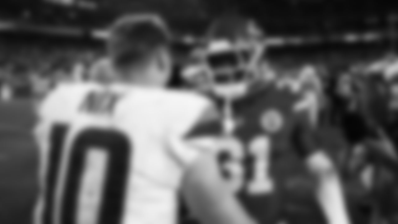 Kansas City Chiefs linebacker Jeffrey Bassa (31) talks with Denver Broncos quarterback Bo Nix (10) after an NFL week 17 matchup against the Denver Broncos, Thursday, December 25, 2025.