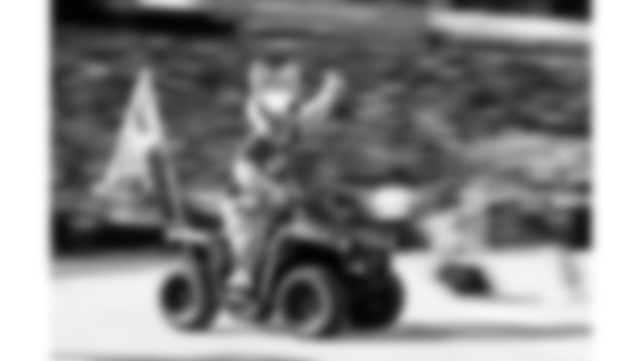 The Kansas City Chiefs mascot, KC Wolf, rides a quad prior to an NFL football game against the Denver Broncos, Sunday, Jan. 1, 2023, in Kansas City, Missouri.