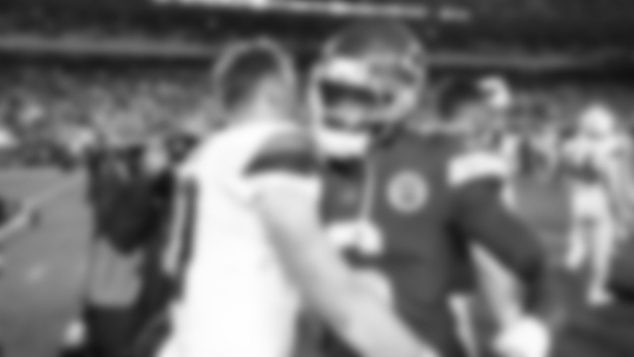 Kansas City Chiefs safety Bryan Cook (6) talks with Denver Broncos quarterback Bo Nix (10) after an NFL week 17 matchup against the Denver Broncos, Thursday, December 25, 2025.