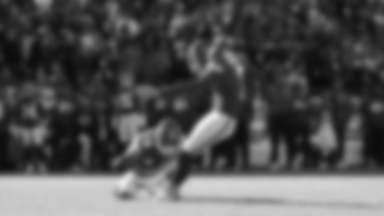 Punter Matt Araiza (14) holds the ball for a Kansas City Chiefs kicker Harrison Butker (7) field goal during a week 12 NFL Football game against the Indianapolis Colts on Sunday, November 23, 2025 in Kansas City, MO