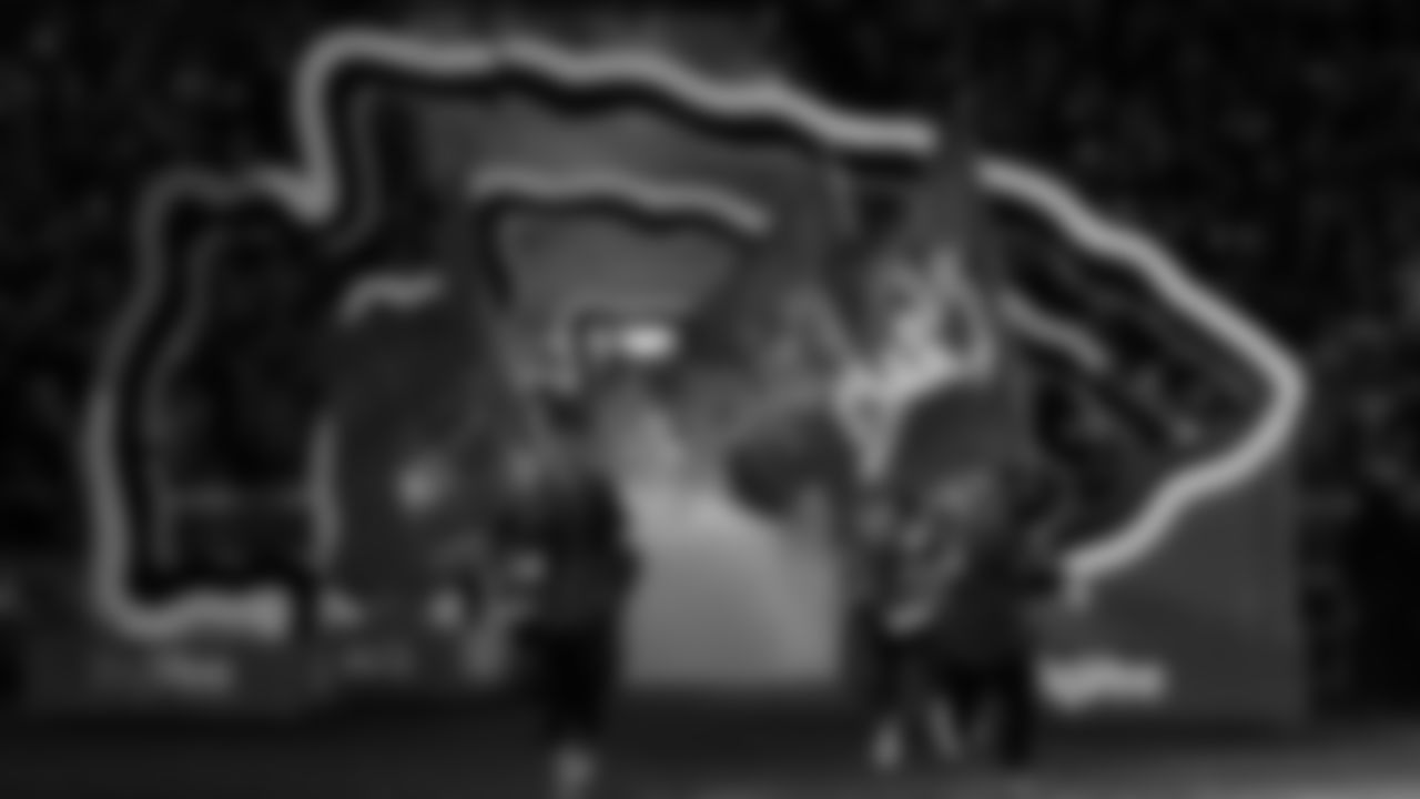 Chiefs Flag Runners enter the field prior to a week 14 NFL Football game against the Houston Texans on Sunday, December 7, 2025 in Kansas City, MO.