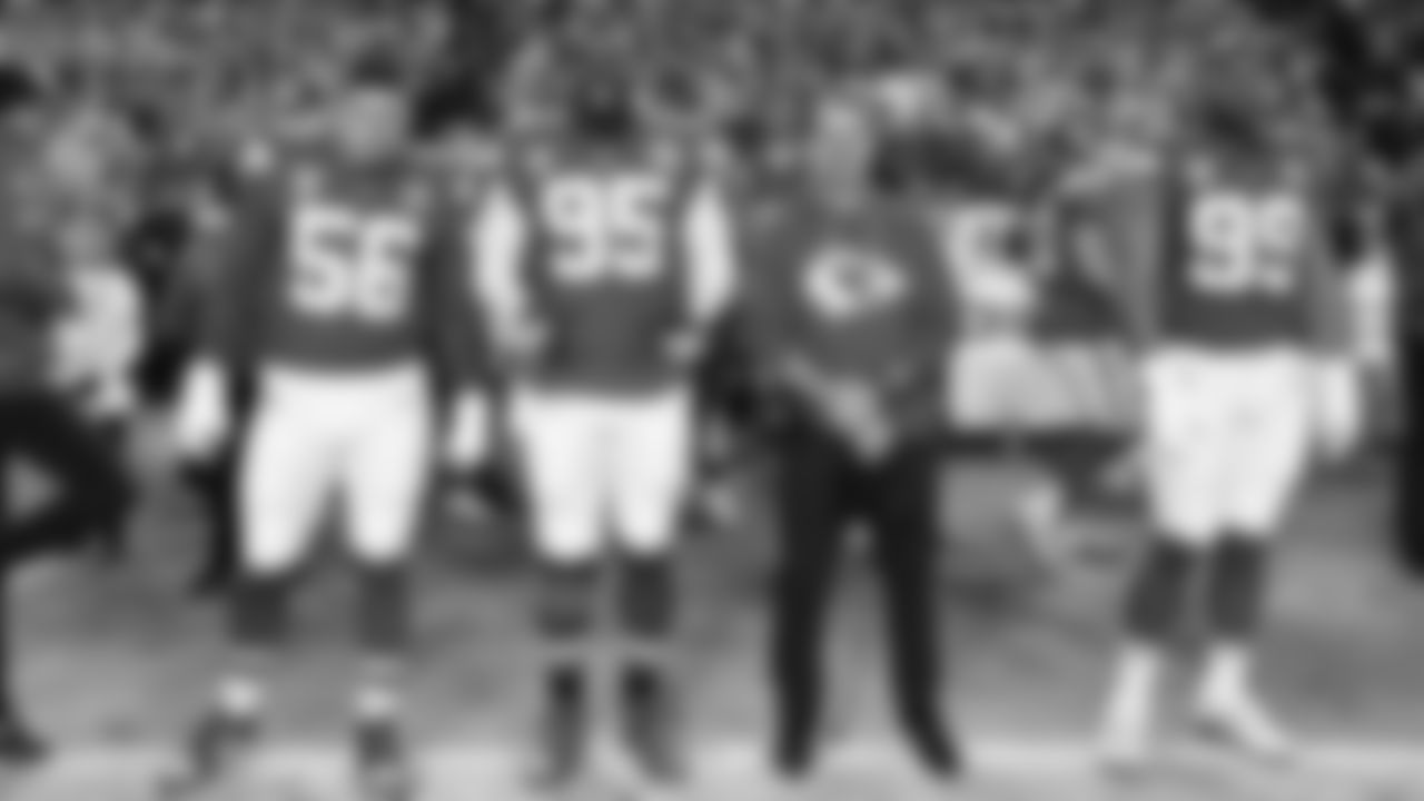 Defensive end George Karlaftis (56), defensive tackle Chris Jones (95), Defensive Line coach Joe Cullen and Kansas City Chiefs defensive lineman Jerry Tillery (99) on the sideline prior to an NFL week 17 matchup against the Denver Broncos, Thursday, December 25, 2025.