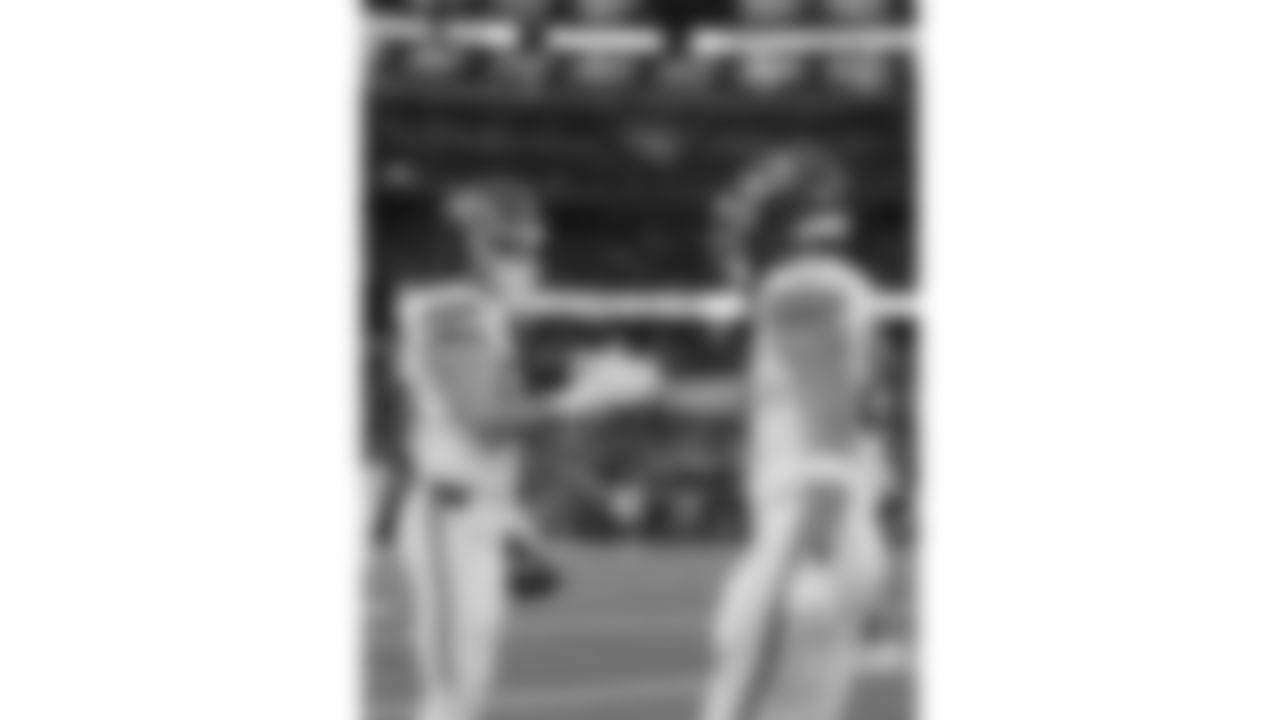 Kansas City Chiefs tight end Robert Tonyan (85) and Kansas City Chiefs tight end Travis Kelce (87) prior to a week 13 NFL football game against the Dallas Cowboys on Thursday, November 27, 2025 in Arlington, TX.