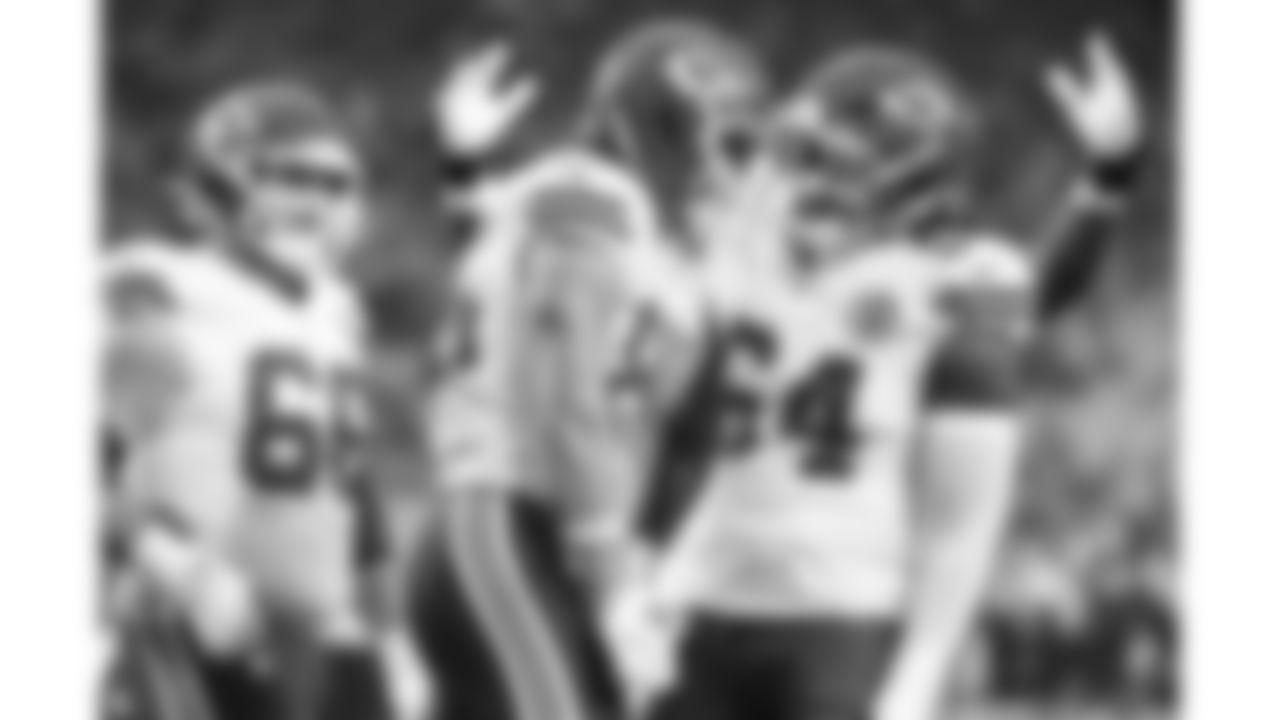 Kansas City Chiefs tight end Robert Tonyan (85) celebrates with offensive tackle Wanya Morris (64) after scoring a touchdown during a preseason week 2 NFL football game against the Seattle Seahawks, Friday, August 15, 2025 in Seattle, WA.