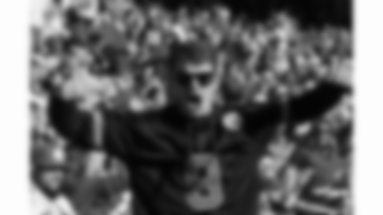 A Kansas City Chiefs fan cheers during a week 12 NFL football game against the Indianapolis Colts, Sunday, November 23, 2025 in Kansas City, MO.