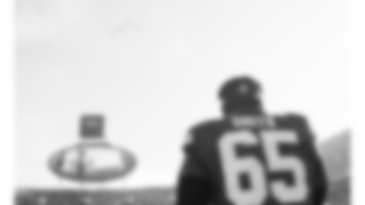 Kansas City Chiefs guard Trey Smith (65) watches the flyover during the National Anthem prior to a week 12 NFL football game against the Indianapolis Colts, Sunday, November 23, 2025 in Kansas City, MO.