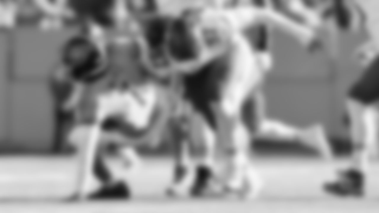 Kansas City Chiefs defensive end Ashton Gillotte (97) sacks Titans quarterback Cam Ward (1) during a week 16 NFL Football game against the Tennessee Titans on Sunday, December 21, 2025 in Nashville, Tennessee.