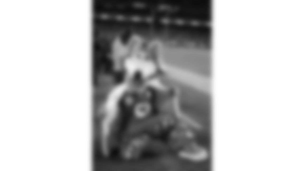 KC Wolf wears a white Build-A-Bear coat during a week 14 NFL Football game against the Houston Texans on Sunday, December 7, 2025 in Kansas City, MO.