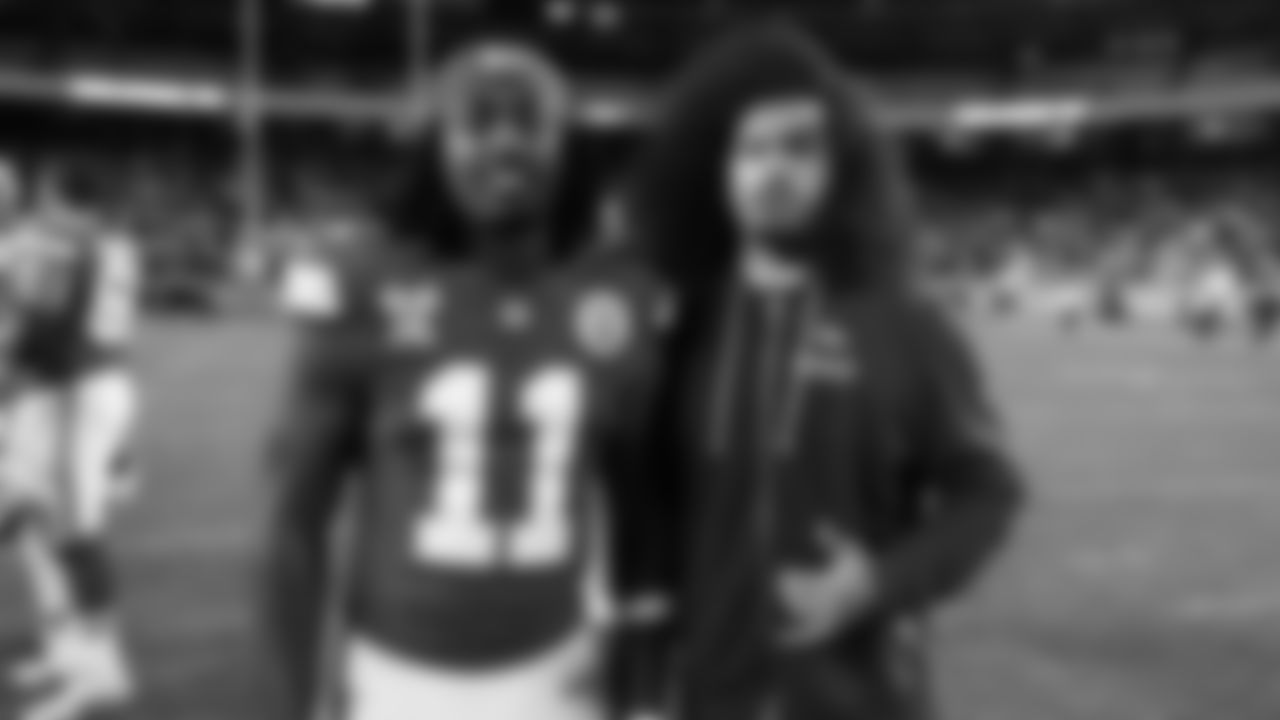 Kansas City Chiefs wide receiver Jalen Royals (11) poses with a Denver Bronco after an NFL week 17 matchup against the Denver Broncos, Thursday, December 25, 2025.