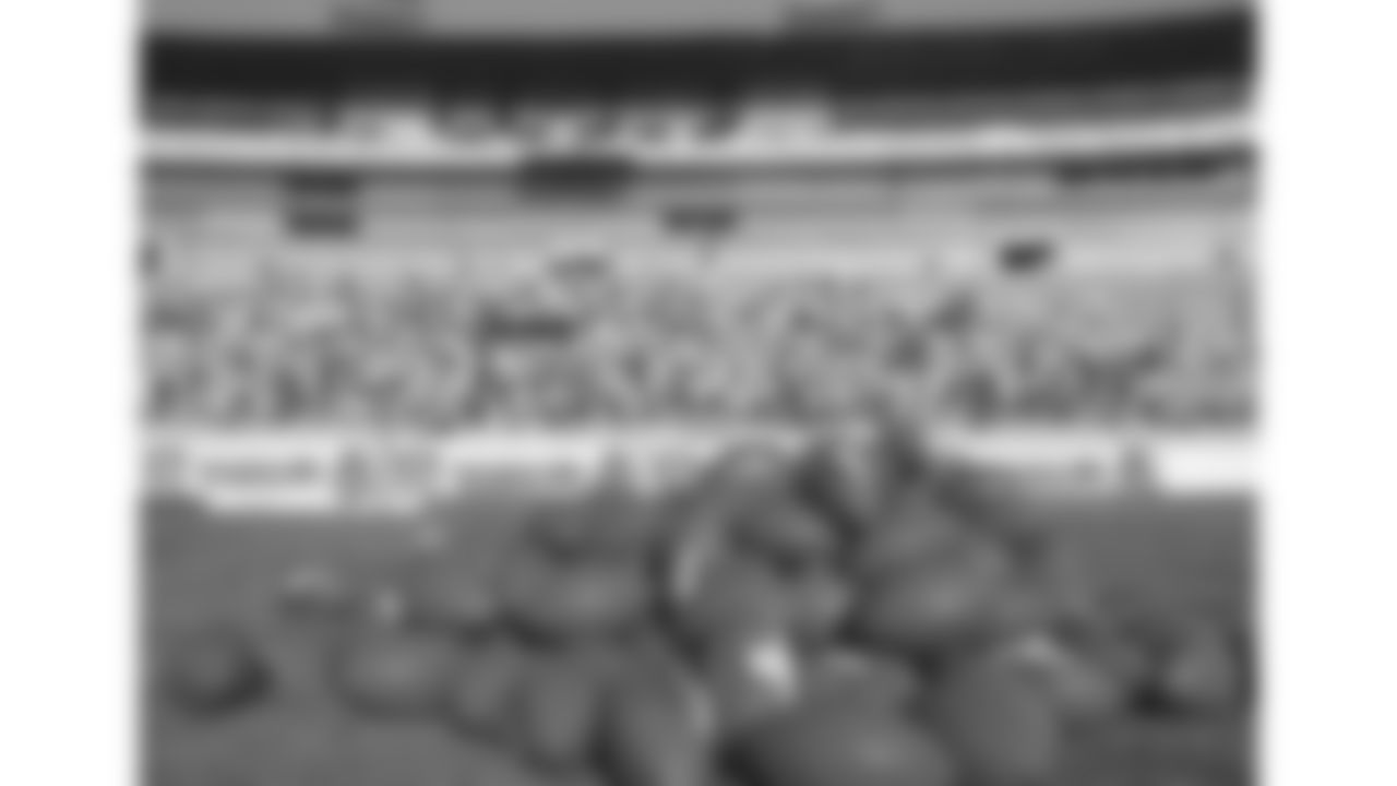 A pile of footballs sit on the field during the 1996 preseason trip to Monterrey, Mexico.