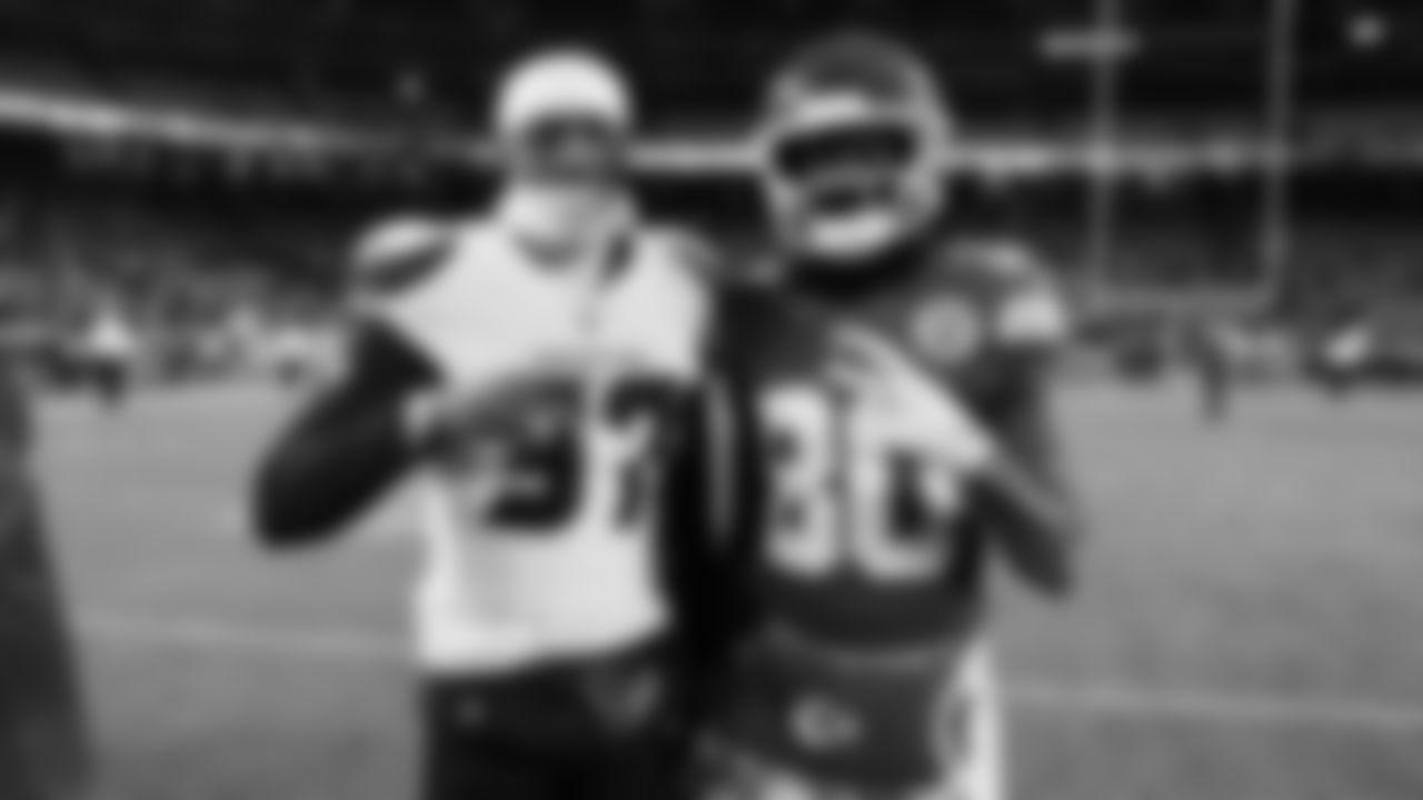 Kansas City Chiefs wide receiver Tyquan Thornton (80) poses with Houston Texans corner back Ameer Speed (37) after an NFL week 14 matchup against the Houston Texans, Sunday December 7, 2025.