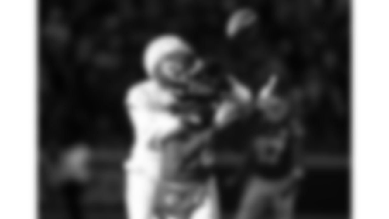 Los Angeles Chargers cornerback Cam Hart (20) breaks up a pass to Kansas City Chiefs wide receiver Tyquan Thornton (80) during a week 15 NFL football game, Sunday, December 14, 2025 in Kansas City, MO.