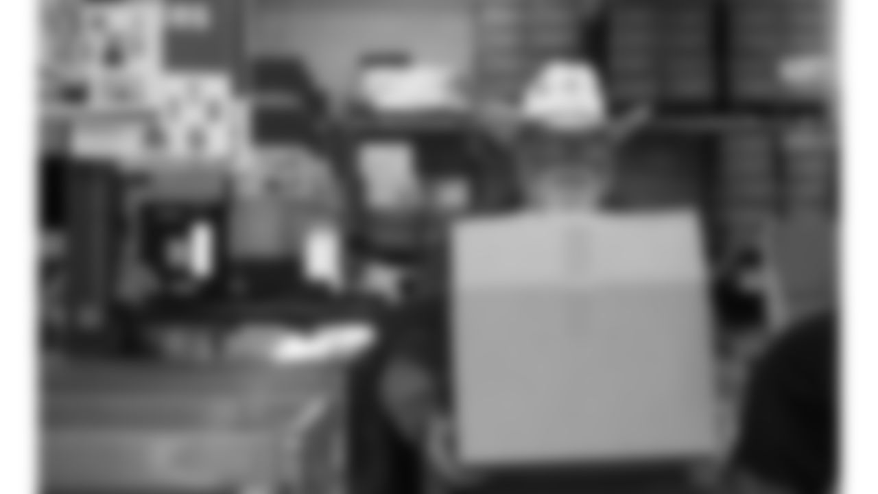 Red Coaters volunteer at the annual Souper Bowl at the Harvesters Community Food Network in Kansas City on Tuesday, February 4, 2026.