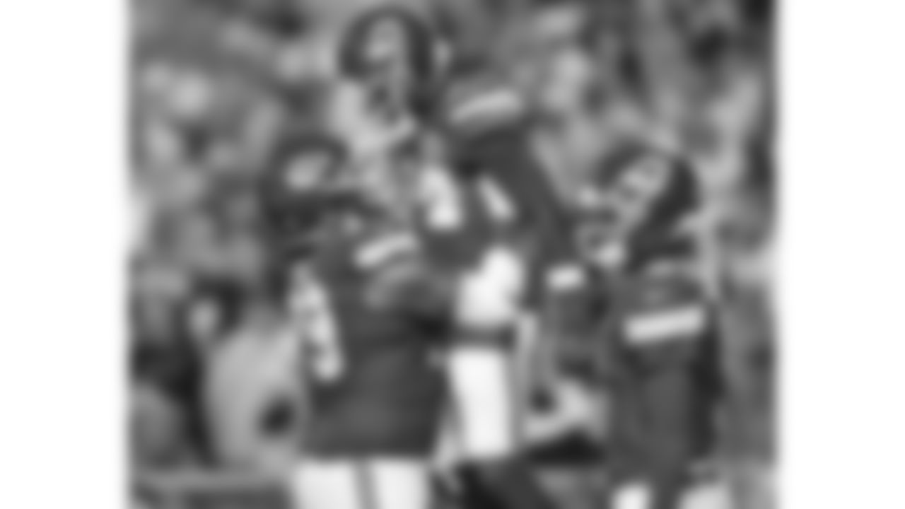 Kansas City Chiefs offensive lineman Esa Pole (79) lifts running back Brashard Smith (24) in the end zone during a week 17 NFL football game against the Denver Broncos, Thursday, December 25, 2025 in Kansas City, MO.