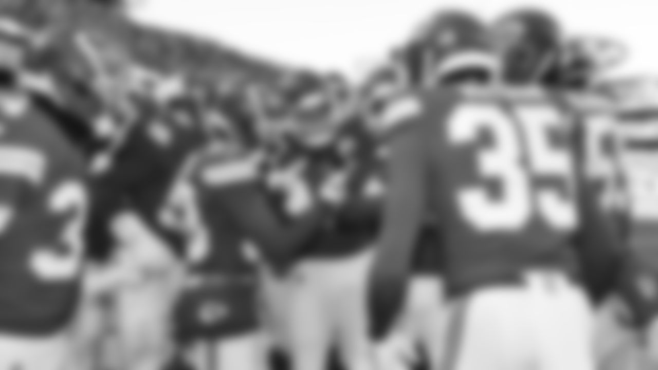 The Kansas City Chiefs defense celebrates in the end zone after an interception during a week 15 NFL football game against the Los Angeles Chargers, Sunday, December 14, 2025 in Kansas City, MO.