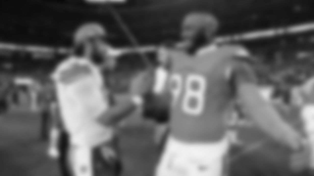 Kansas City Chiefs quarterback Gardner Minshew (17) and Broncos defensive lineman John Franklin Myers (98) after a week 11 NFL Football game against the Denver Broncos on Sunday, November 16, 2025 in Denver, Colorado.