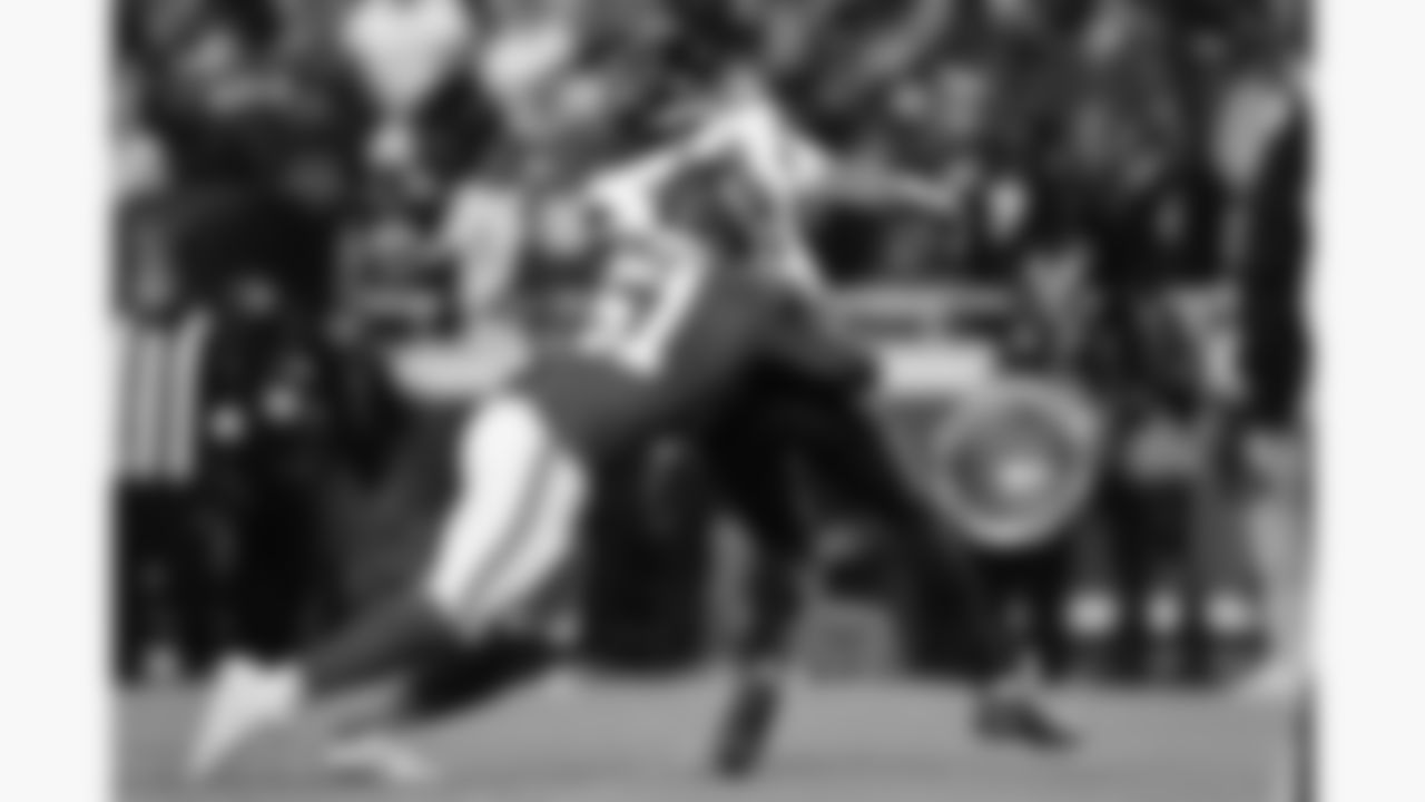 Kansas City Chiefs defensive end Mike Danna (51) hits Houston Texans quarterback C.J. Stroud (7) during a week 14 NFL football game, Sunday, December 7, 2025 in Kansas City, MO.