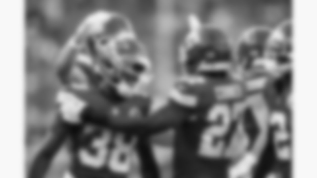 Kansas City Chiefs defensive back Kevin Knowles (38) and defensive back Chamarri Conner (27) celebrate together during the week 4 NFL football game against the Baltimore Ravens, Sunday, September 28, 2025 in Kansas City, MO.