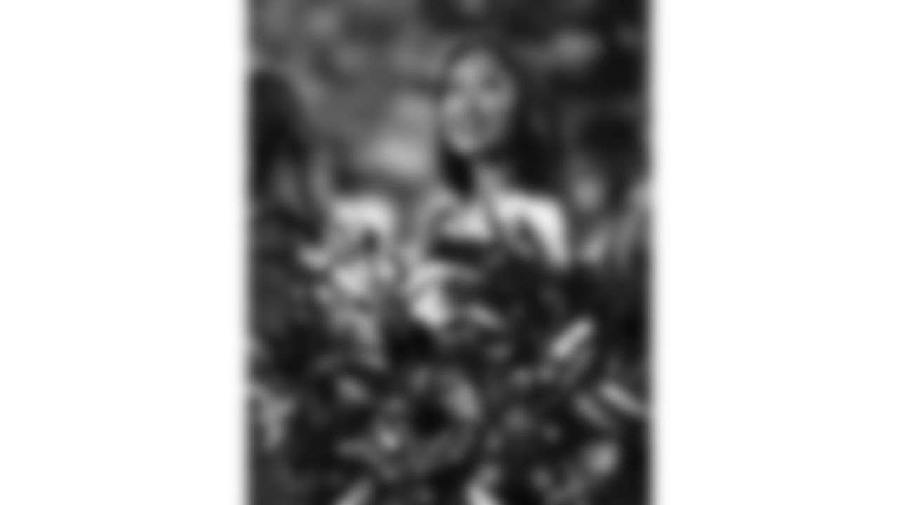 The Kansas City Chiefs Cheerleaders and Entertainment teams prior to a week 17 NFL Football game against the Denver Broncos on December 25, 2025 in Kansas City, MO.