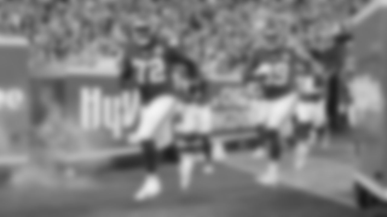 Kansas City Chiefs tackle Chukwuebuka Godrick (72) and Kansas City Chiefs defensive lineman Jerry Tillery (99) runs out the tunnel prior to a preseason week 3 NFL football game against the Chicago Bears, Friday, August 22, 2025 in Kansas City, MO.