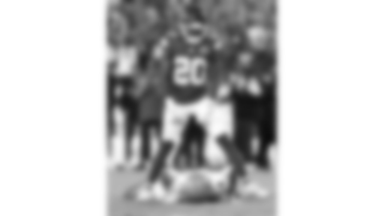 Kansas City Chiefs defensive back Nohl Williams (20) flexes over Detroit Lions wide receiver Amon-Ra St. Brown (14) during the week 6 NFL football game, Sunday, October 12, 2025 in Kansas City, MO.